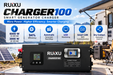 Ruixu Charger 100 smart generator charger in black, shown outdoors on a work platform with a generator and solar panels in the background. The image features feature callout icons highlighting its 6000W power, 94% efficiency, automatic start/stop, LCD monitoring, smart CAN bus communication, and dry contact generator control. www.mygeneratorplus.com